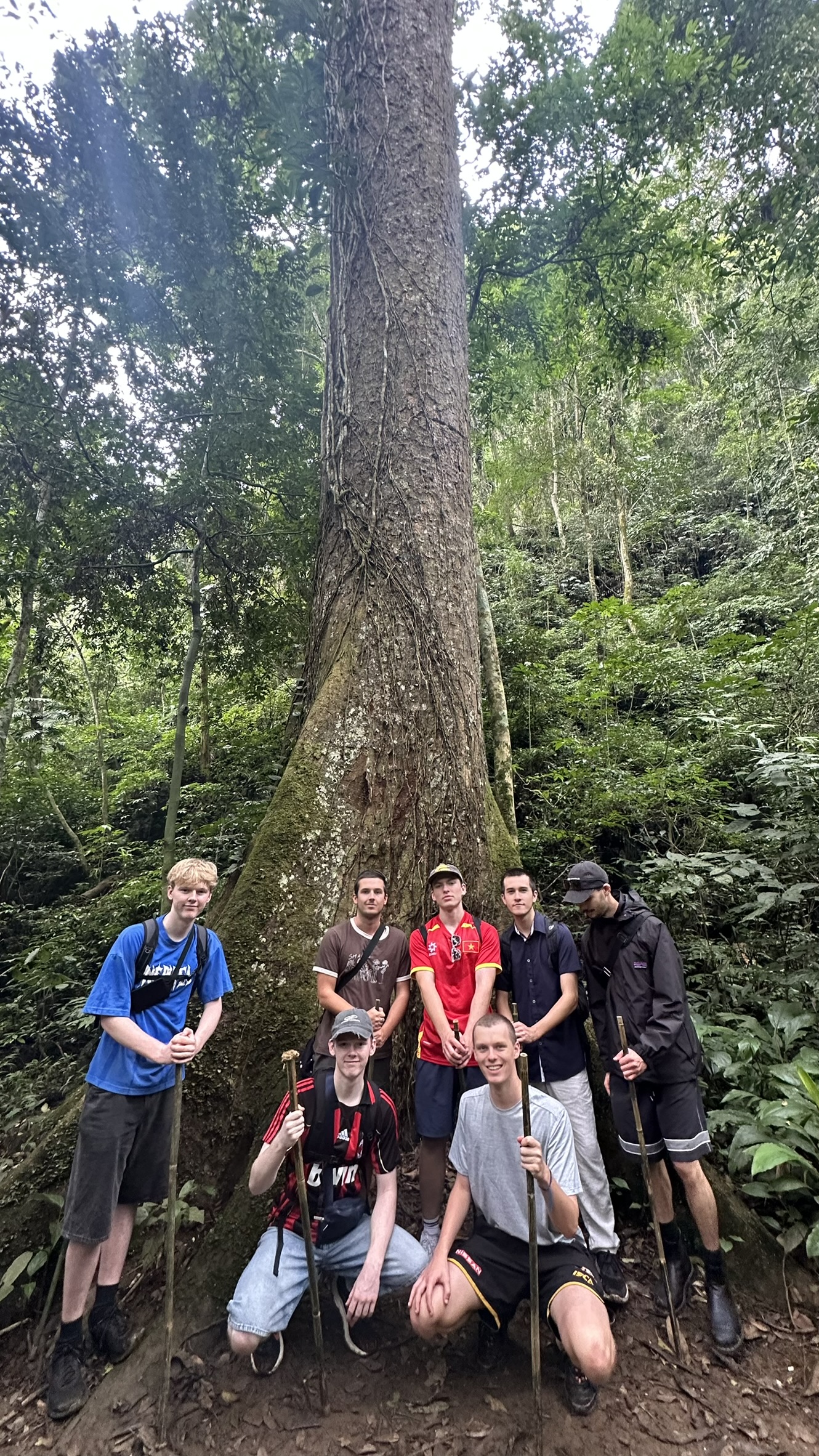 Adventure travelers exploring the biodiversity of Cuc Phuong